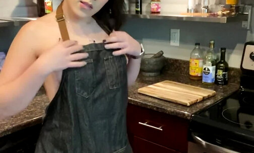 Sexy shemale in the kitchen
