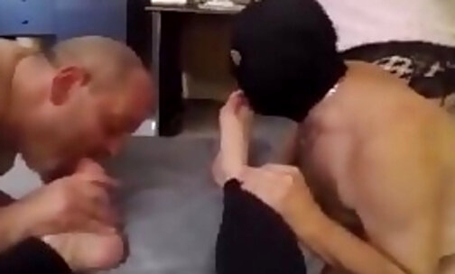 Two guys licking shemale feet and suck her cock