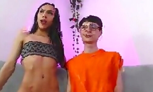 skinny boy in glasses sucks his transgirls cock