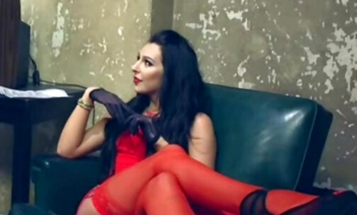 Lady in red fucks a man