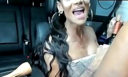 thin and bodyart with tits teases in a car