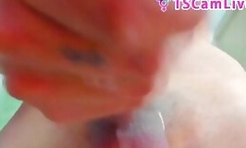 Complete TS spitting her shaft head in a WebCam Show Part2