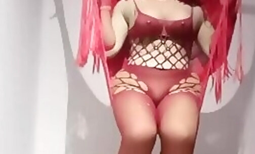 Sexy crossdresser in red bodystockings