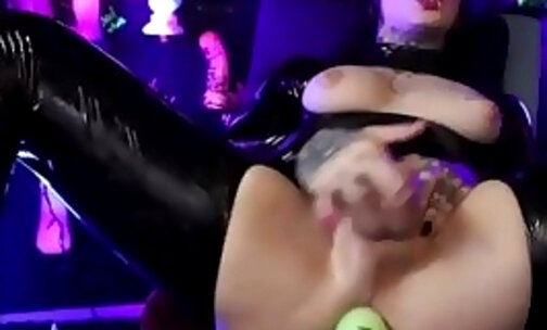 nice tits tattooed tgirl in black latex jumpsuit gets machine fucking on webcam