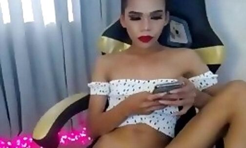 thin filipina tranny and bodyart jerks her dick on cam