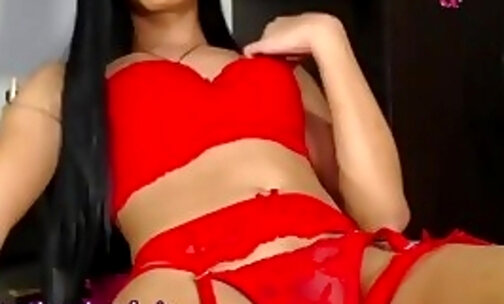slender transgirl in red lingerie wanks off her big dick on webcam