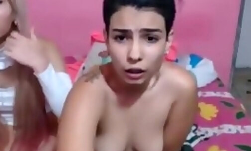 Short haired chick moans while having a shecock inside her muff