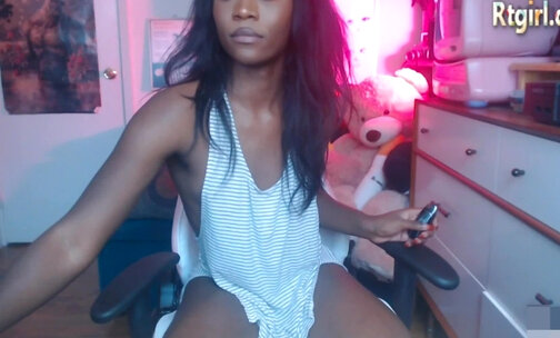 charming black trans babe plays with her big cock on webcam