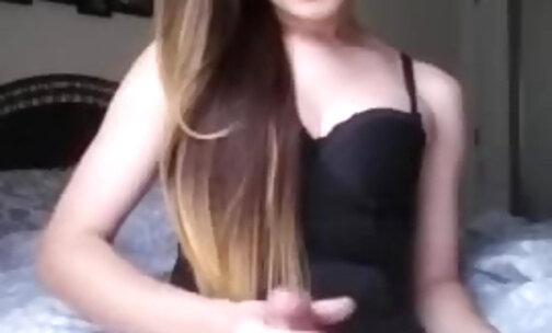 Paige rubs one out in a black corset