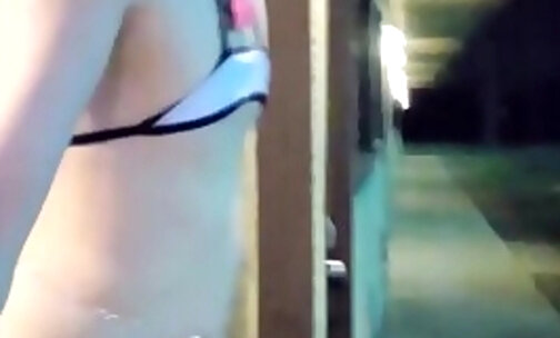 Sissy femboy risky walk around sleazy motel in micro bikini