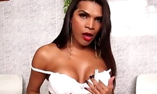 Busty Latina Thais Morales smokes and shows off her tits