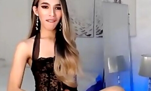 skinny trans sweetie tugs her dick on webcam