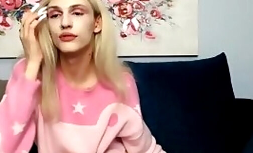 slim blonde tgirl with tattoos teases on webcam