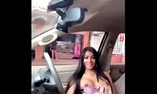 she is a very randy transsexual jacking it in a car wit